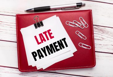 What Are The Penalties For Late Payments On A Rewards Credit Card?