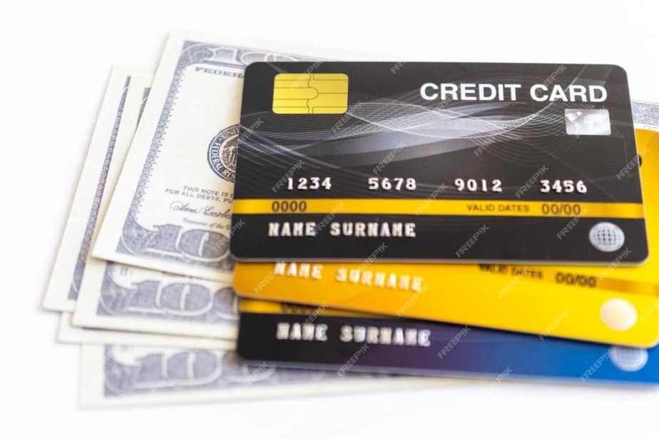 credit cards and dollar banknotes